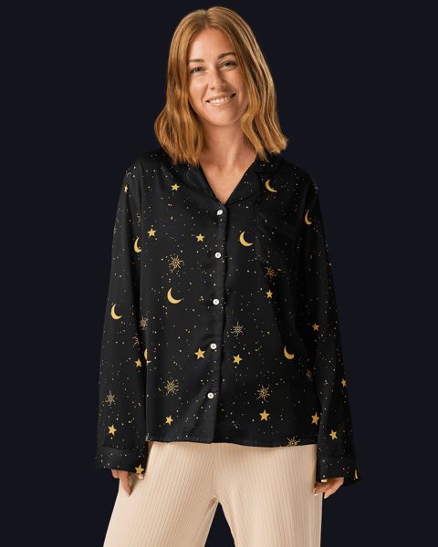 Model wearing the women's Black & Gold pajama top