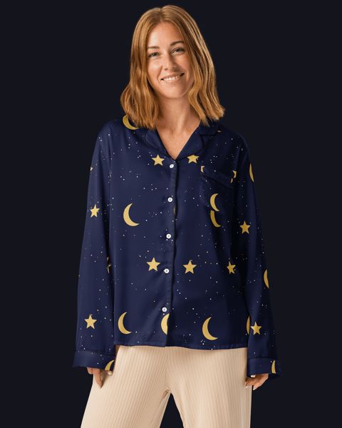 Model wearing the women's Moon & Stars pajama top